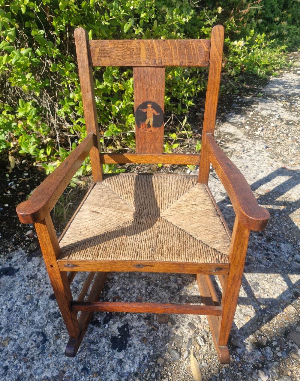 Oak inlaid Childs rocking chair in the manner of Liberty's.  View IV