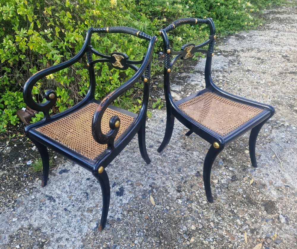 19th century ebonised gilt metal mounted sabre leg armchair plus matching single chair. 