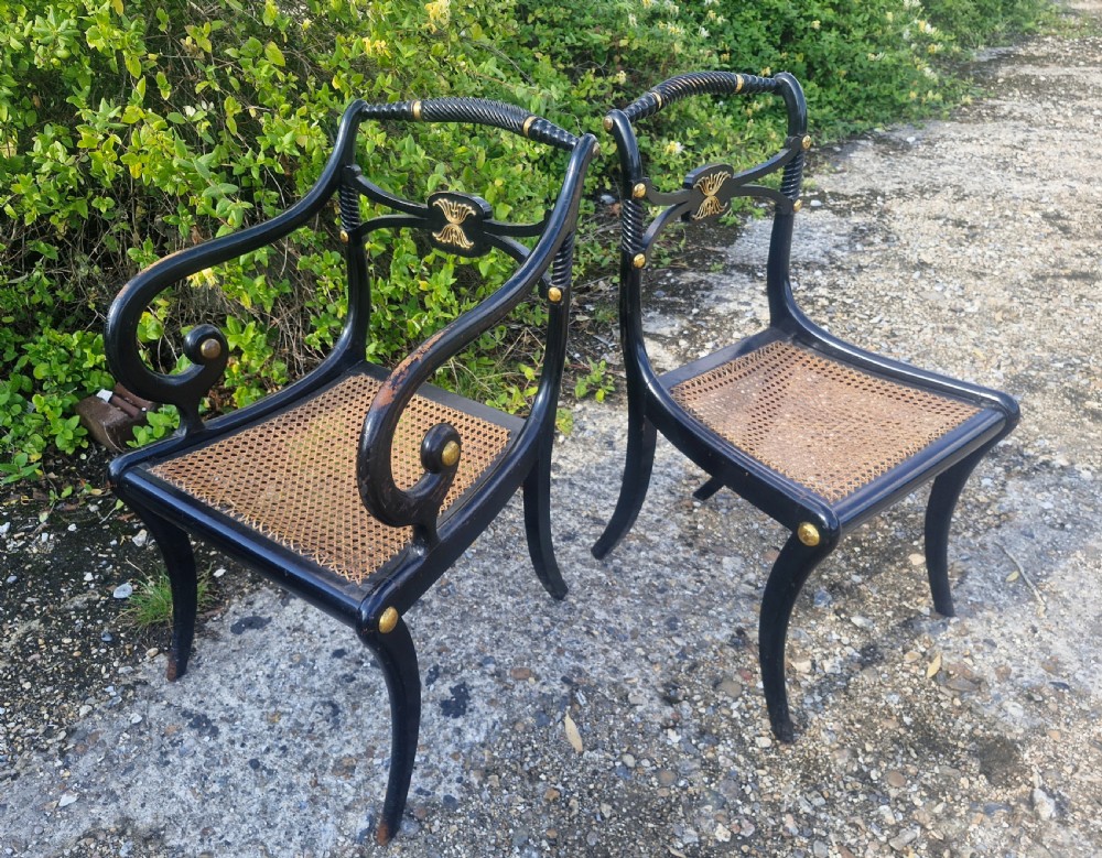 19th century ebonised gilt metal mounted sabre leg armchair plus matching single chair.  View IV