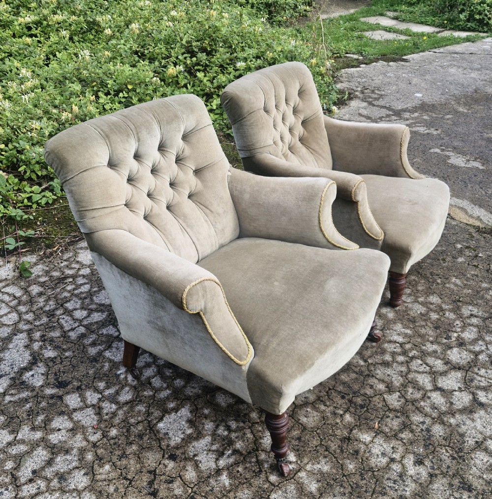 Matched pair of button back  upholstered armchairs.  View III