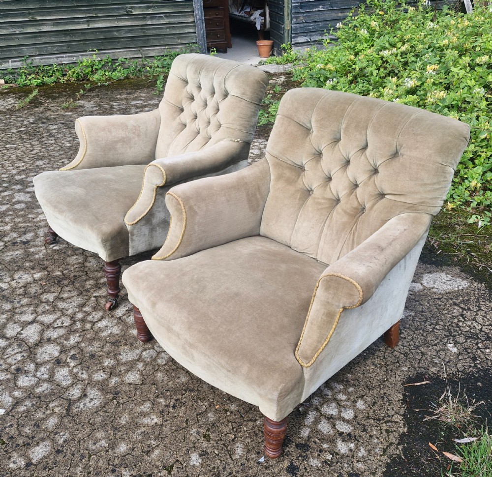 Matched pair of button back  upholstered armchairs.  View IV