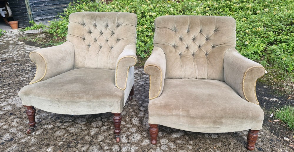 Matched pair of button back  upholstered armchairs.  View V