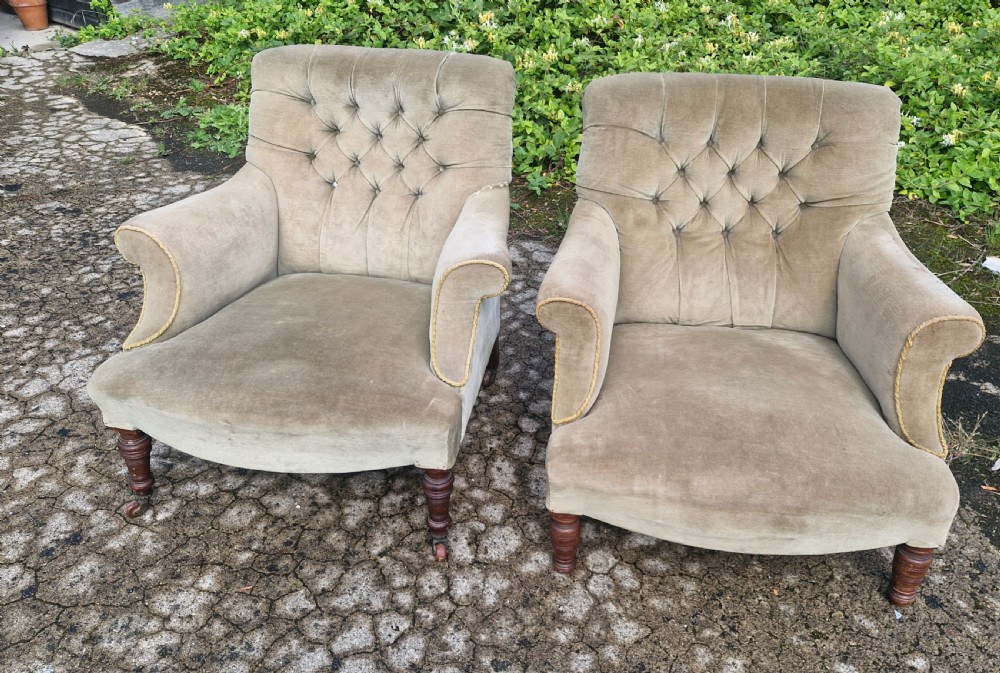 Matched pair of button back  upholstered armchairs.  View VI