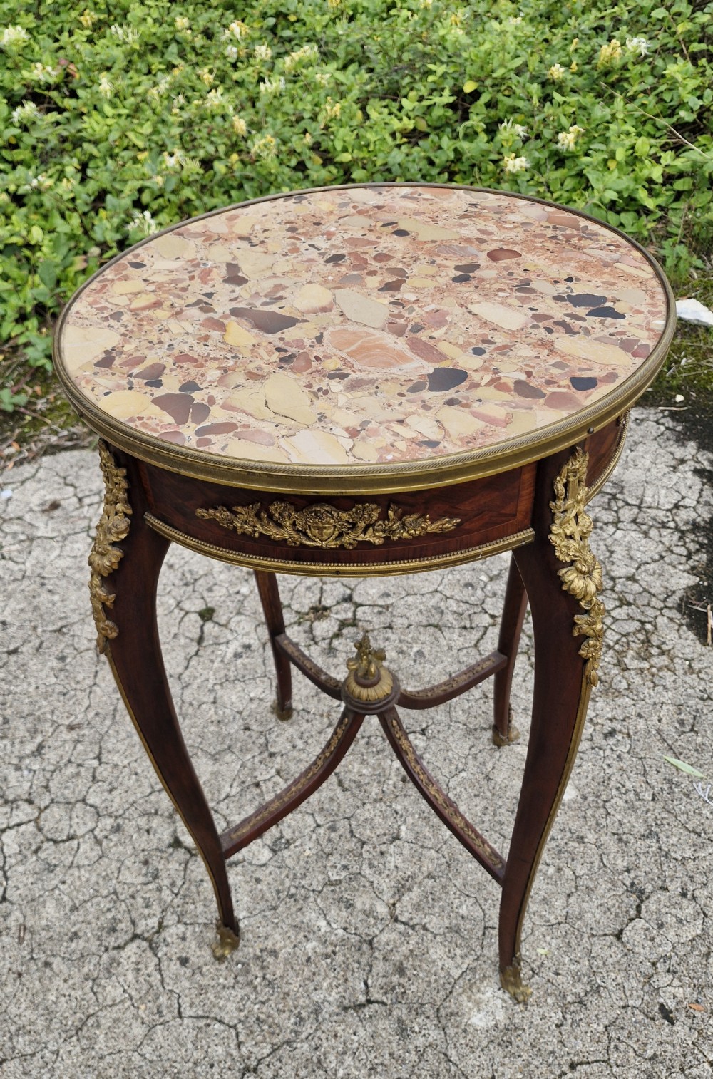 Late 19th century gilt metal mounted marble top occasional table. 