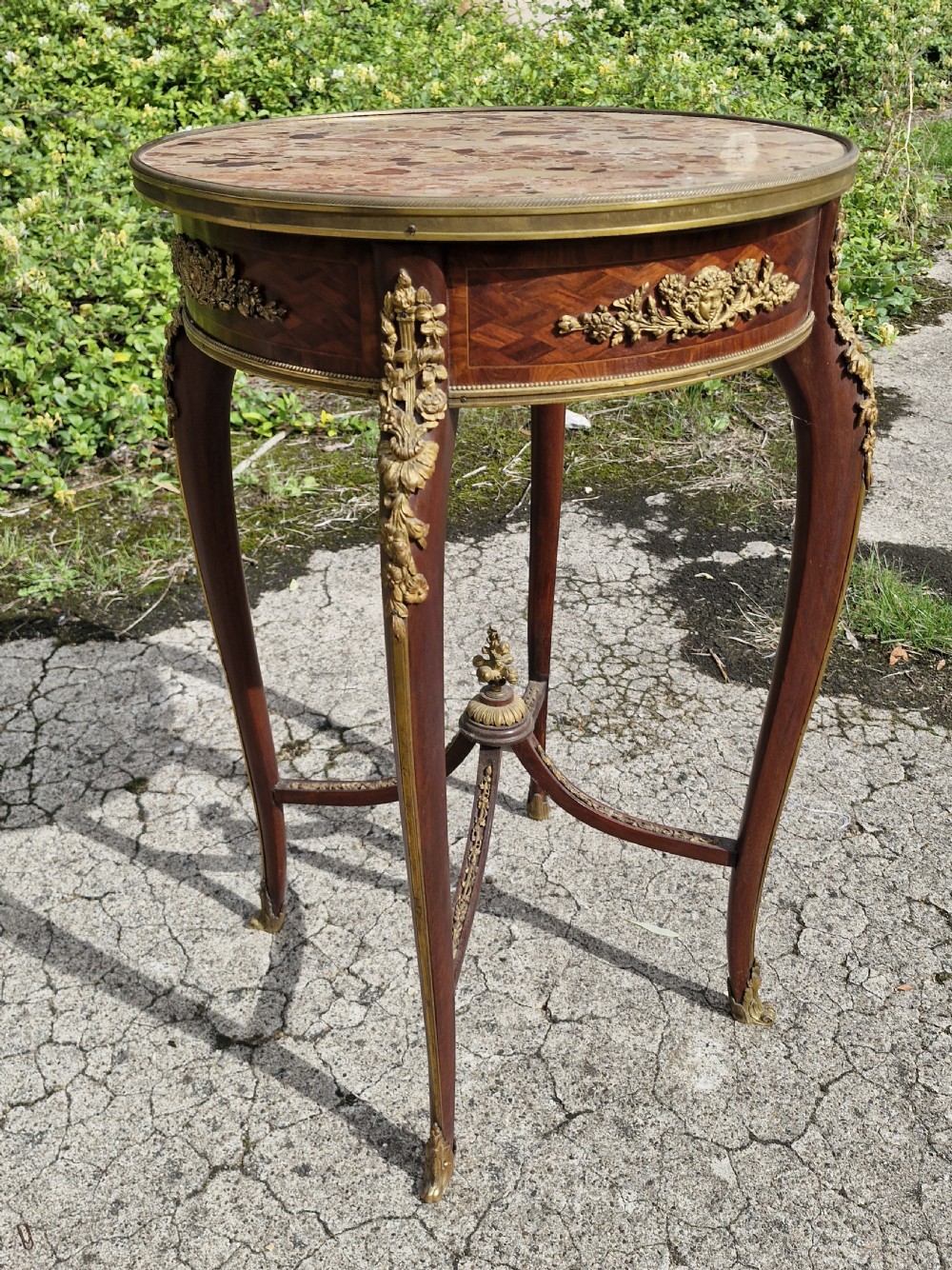Late 19th century gilt metal mounted marble top occasional table.  View II