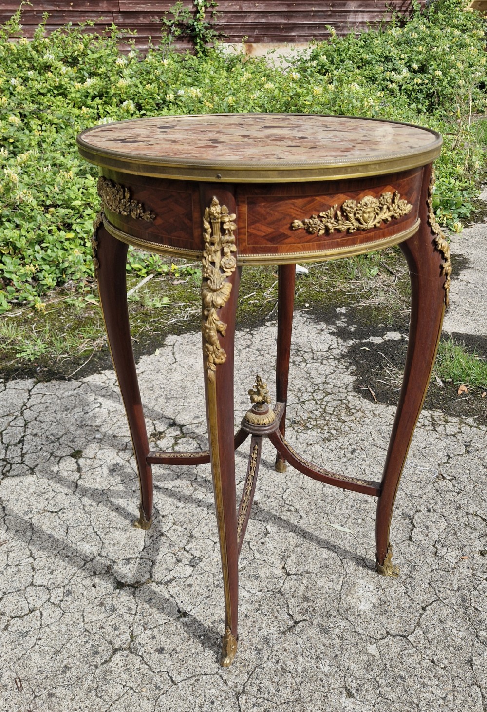 Late 19th century gilt metal mounted marble top occasional table.  View III