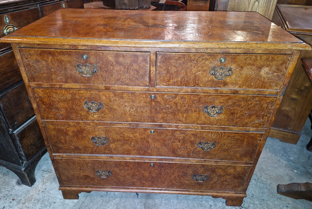 Early 19th century pollard oak and oak chest of drawers.  View III