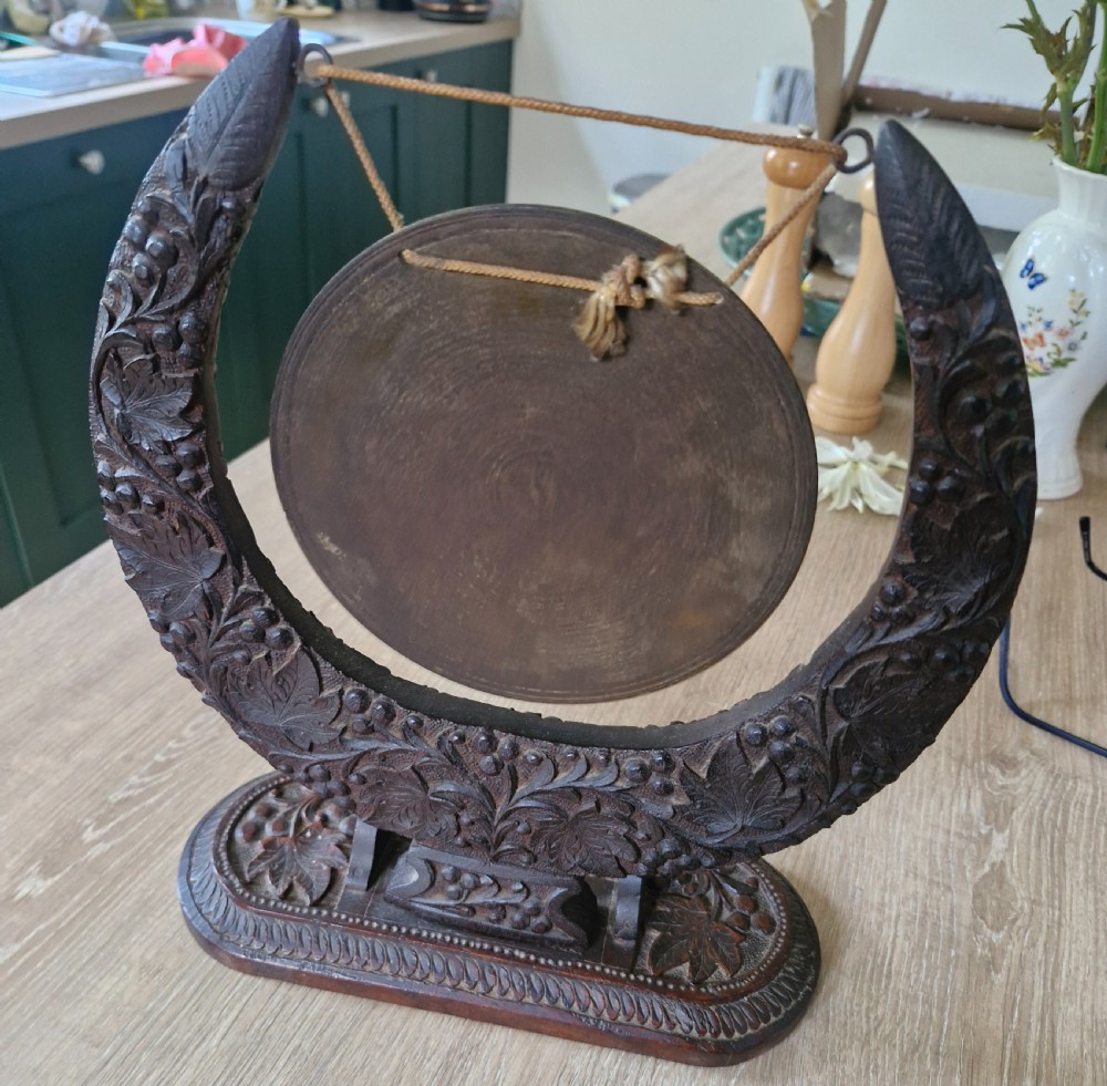 Table top carved Anglo Indian dinner gong. View III