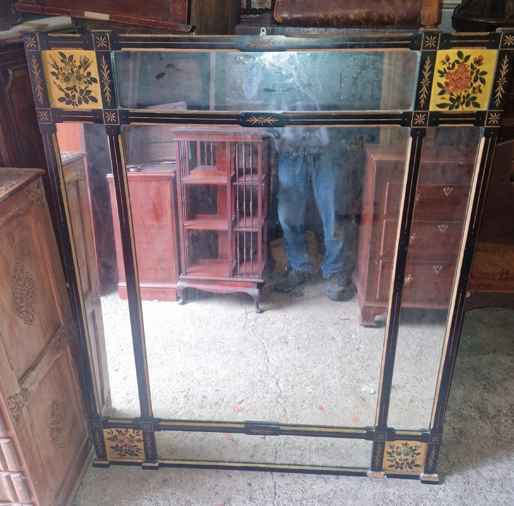 Victorian ebonised and decorated wall mirror. 
