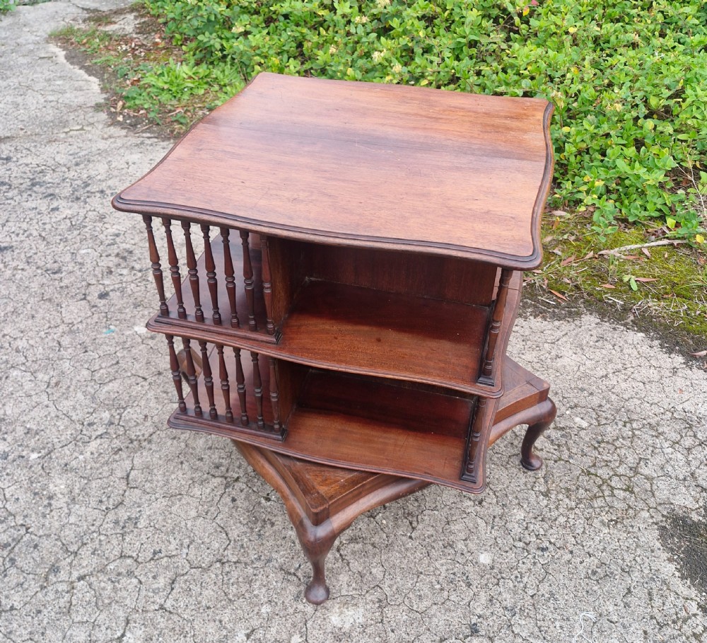 Late Victorian mahogany revolving bookcase in the Manner of Howard.  Stamped.  View II