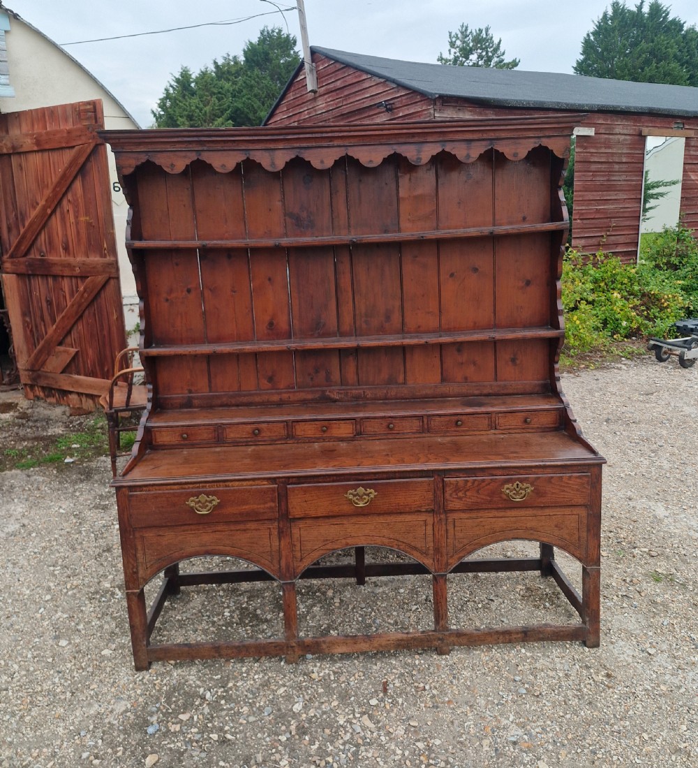 Early 19th century inlaid oak Welsh dresser. 