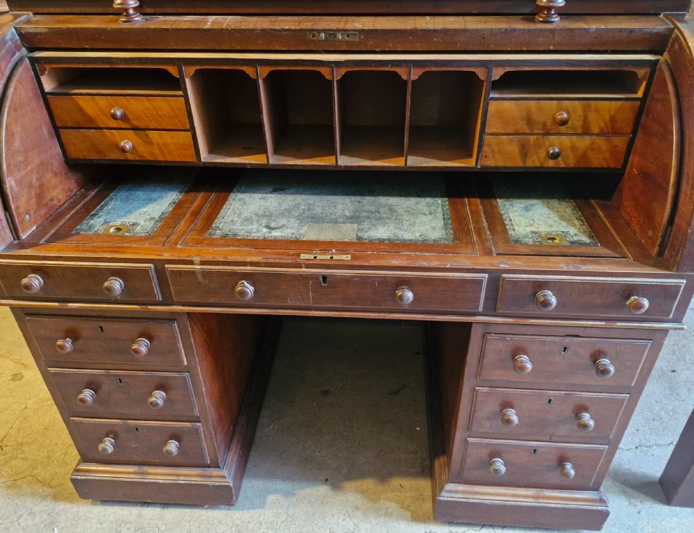 Mahogany free standing cylinder top pedestal desk.  View X