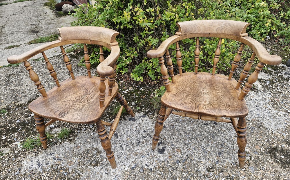 Pair of Late Victorian Smokers bow armchairs. View II