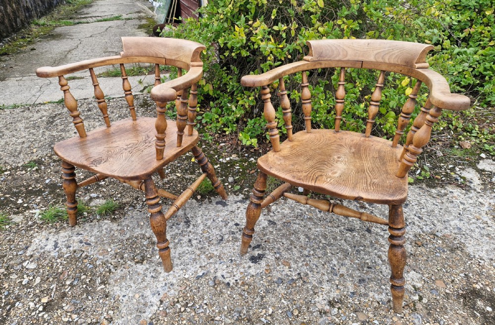 Pair of Late Victorian Smokers bow armchairs. View IV