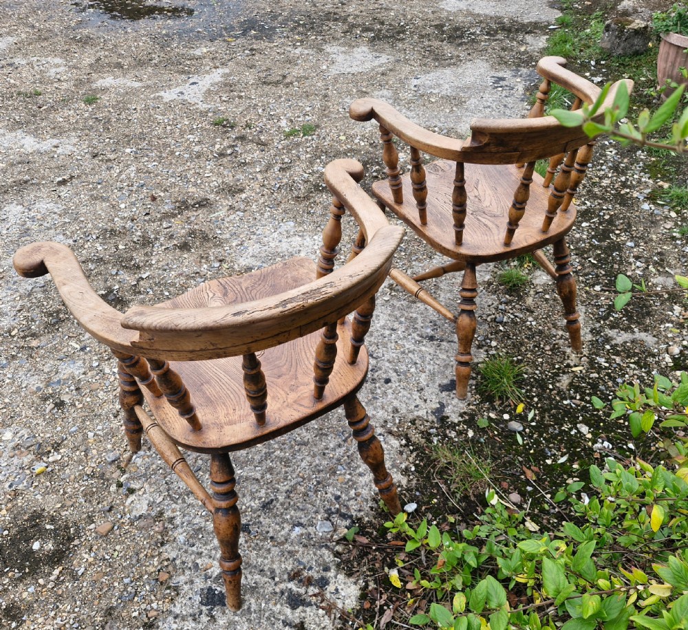 Pair of Late Victorian Smokers bow armchairs. View VI