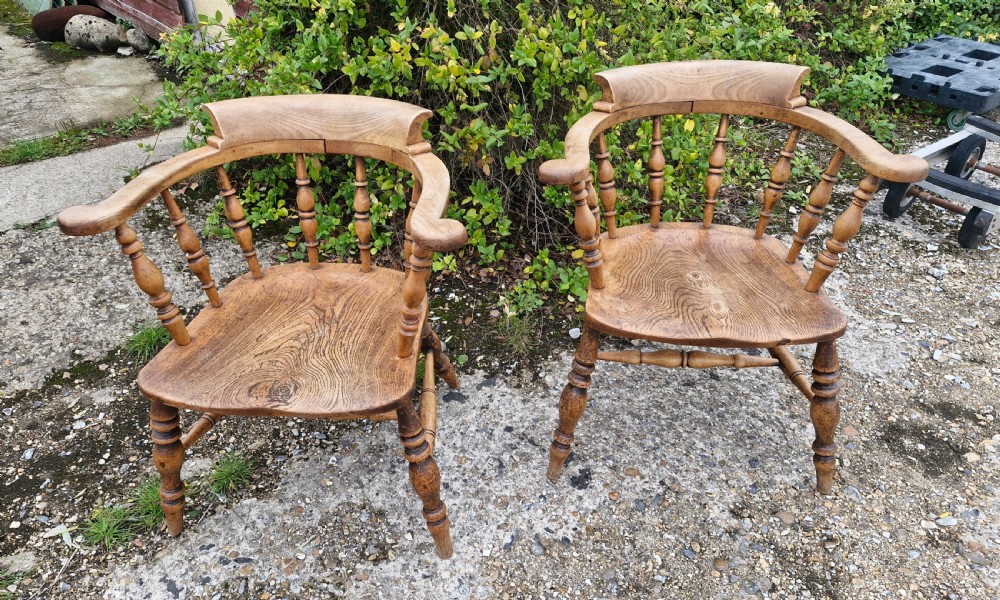 Pair of Late Victorian Smokers bow armchairs. View VIII