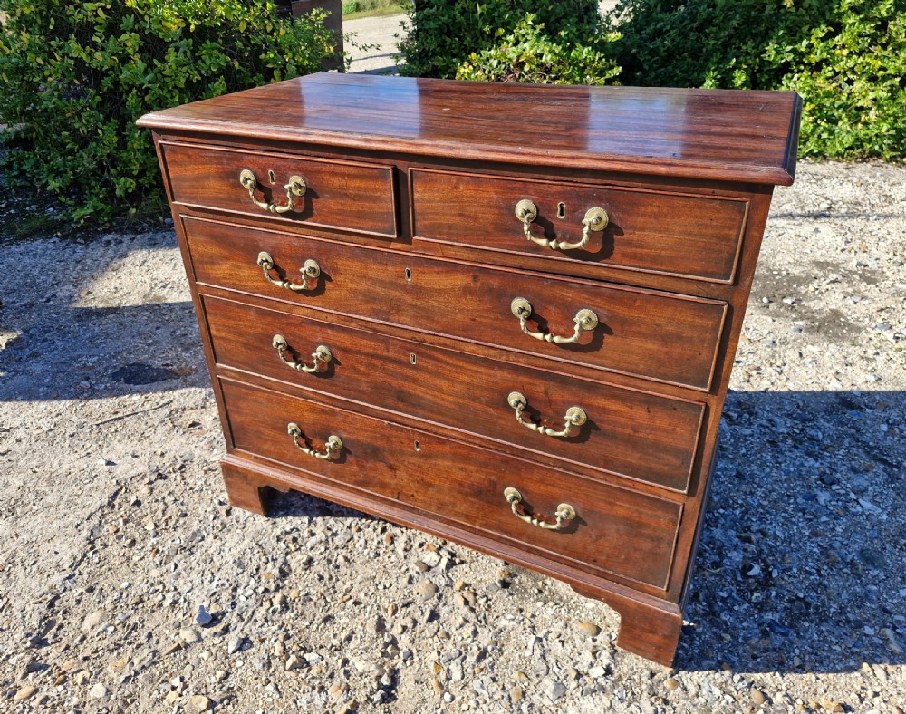 Mid 18th century mahogany chest of drawers in the Chippendale manner.  View IV