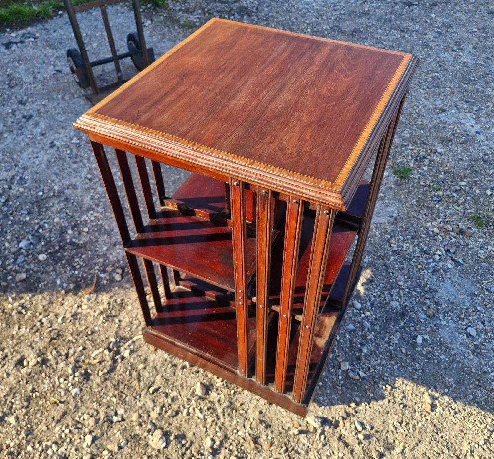 Edwardian inlaid mahogany revolving bookcase. 