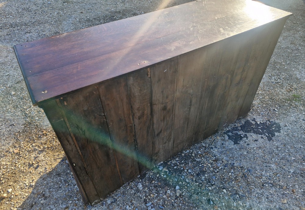Antique panelled oak dresser base.  View II