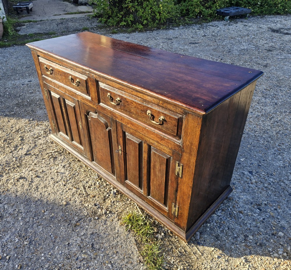 Antique panelled oak dresser base.  View VI
