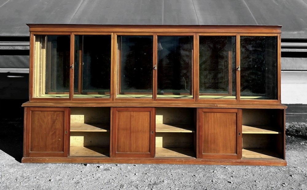 Very large mahogany mirror backed shop or chemist cabinet  - glass shelves to top. View XV