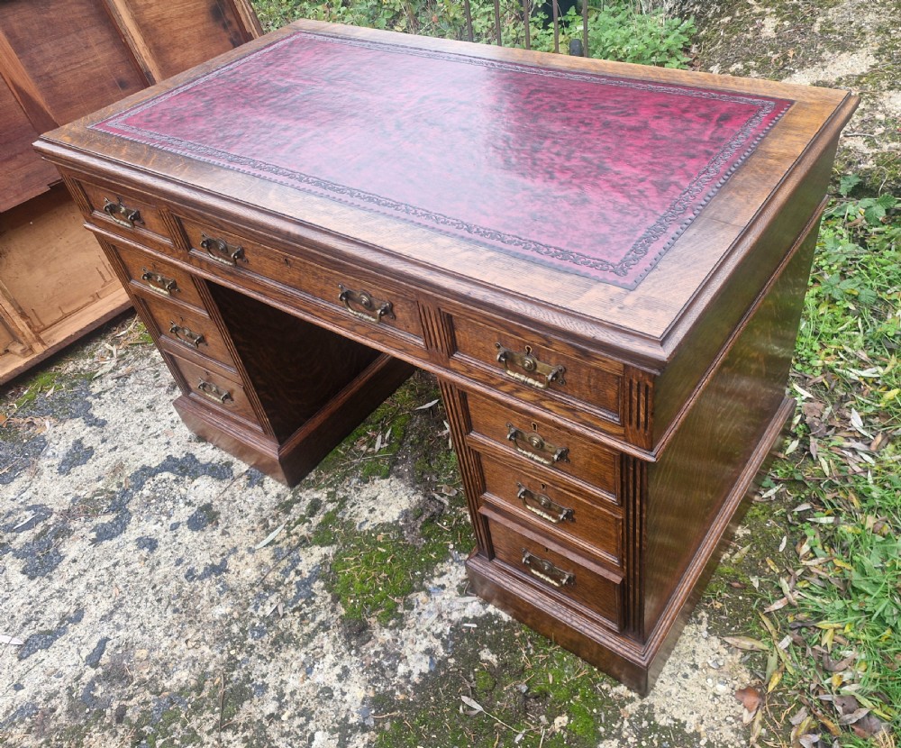 Oak kneehole pedestal writing desk  View III