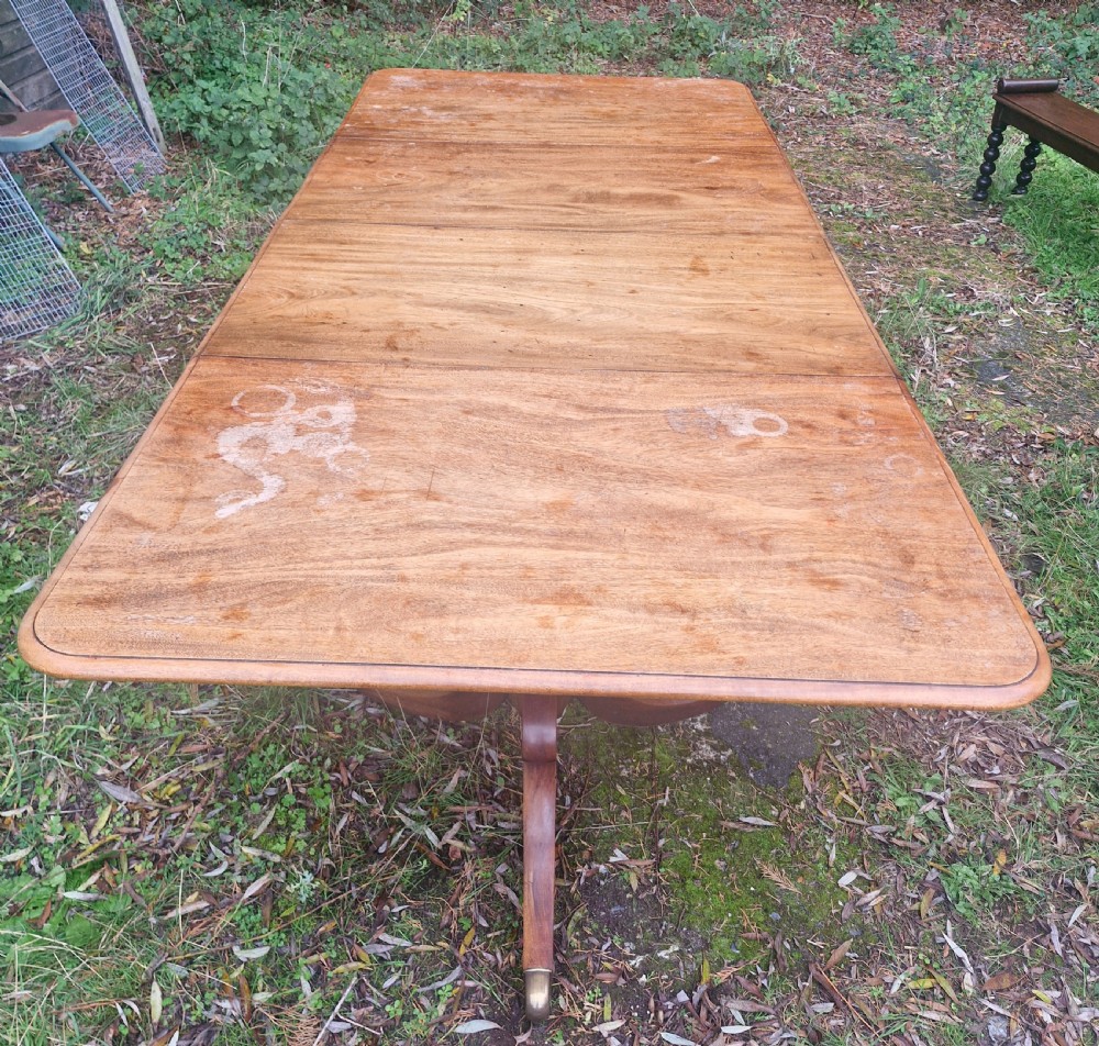 Regency mahogany twin pillar dining table with 2 extra leaves. View III