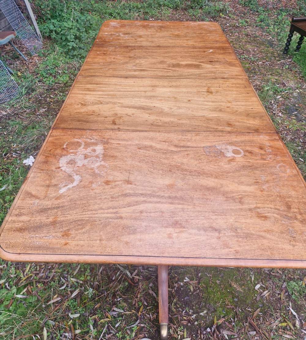 Regency mahogany twin pillar dining table with 2 extra leaves. View VIII