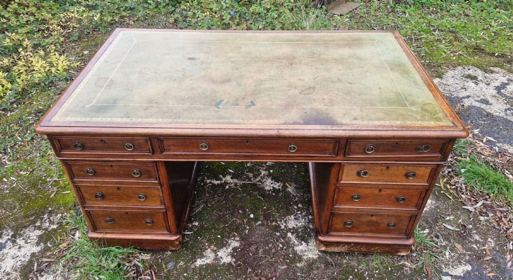 Large Victorian oak kneehole pedestal writing desk. 