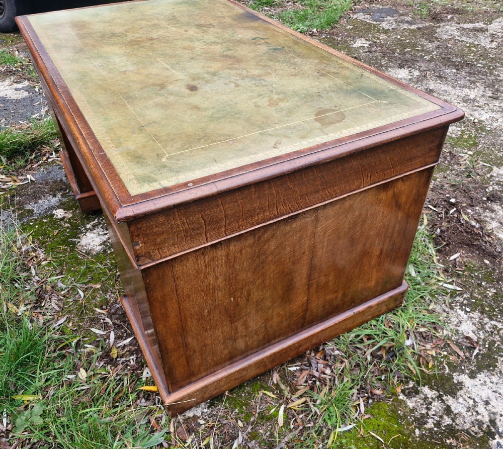 Large Victorian oak kneehole pedestal writing desk.  View IV