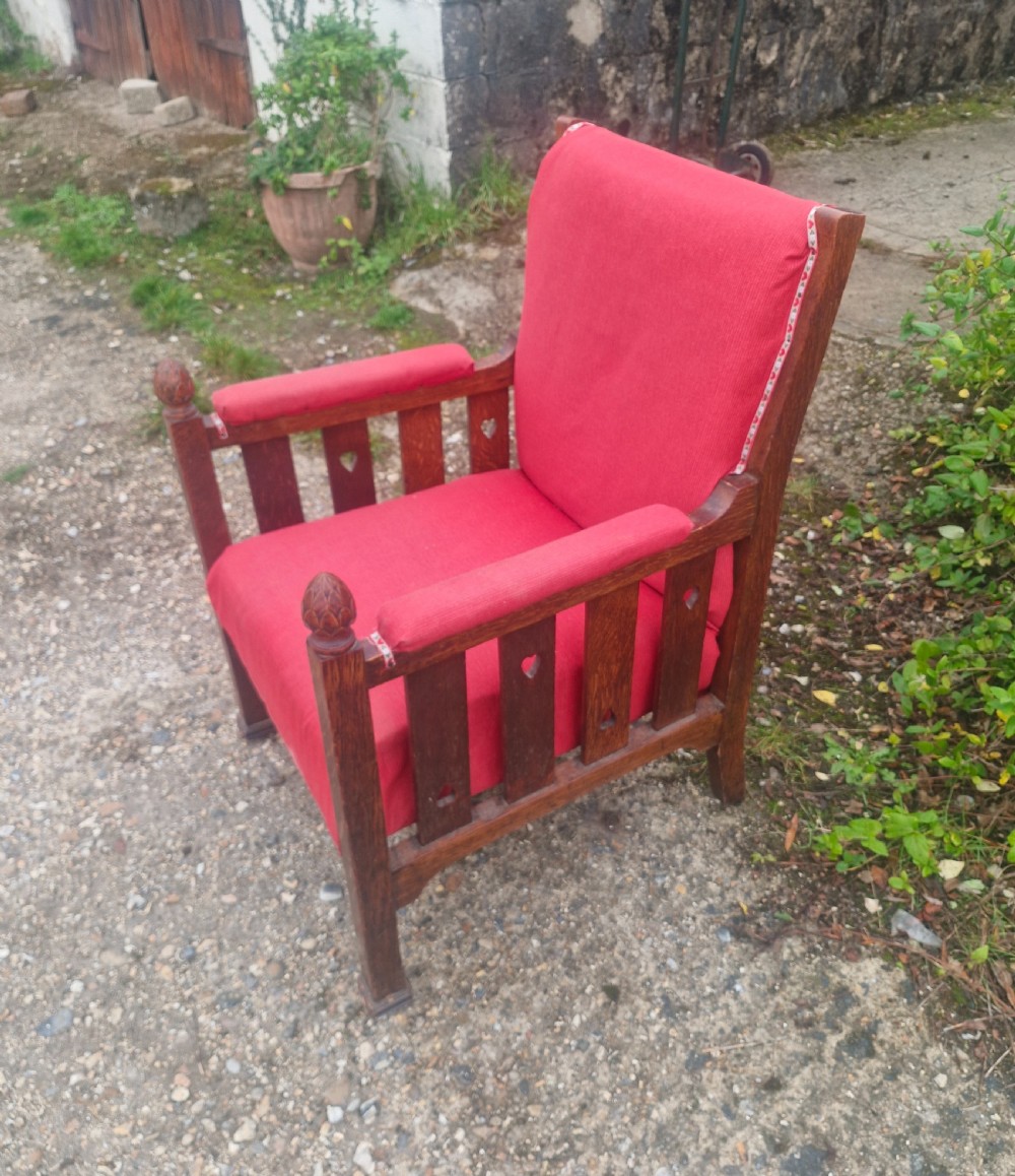 Interesting late Victorian oak Arts and crafts armchair.  View VII