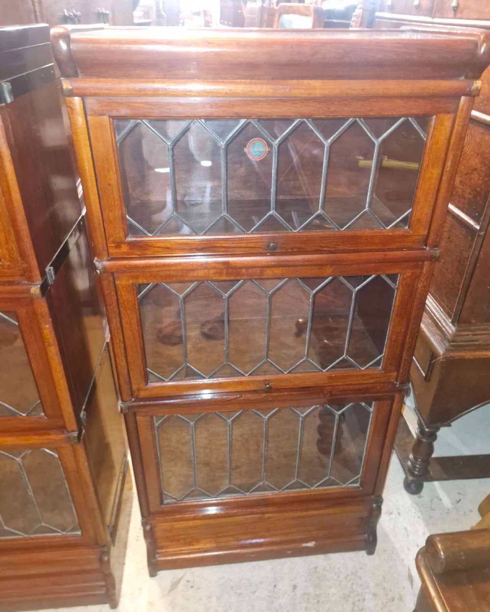 Pair of Dinky mahogany Leaded glazed Globe Wernicke bookcase cabinets. View III
