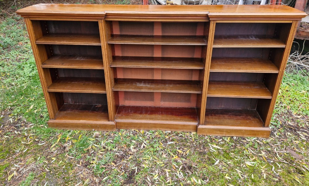 Long late Victorian open front bookcase adjustable shelves. 
