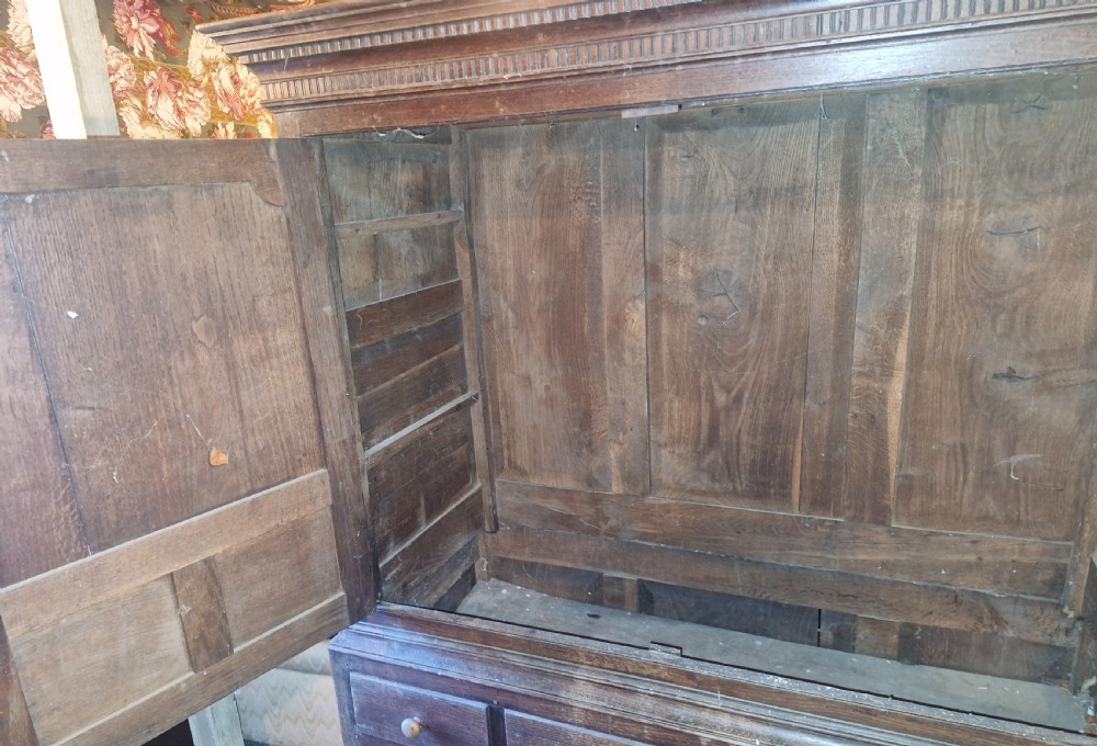 Regency oak Welsh press hall cupboard with original hooks.  View VI