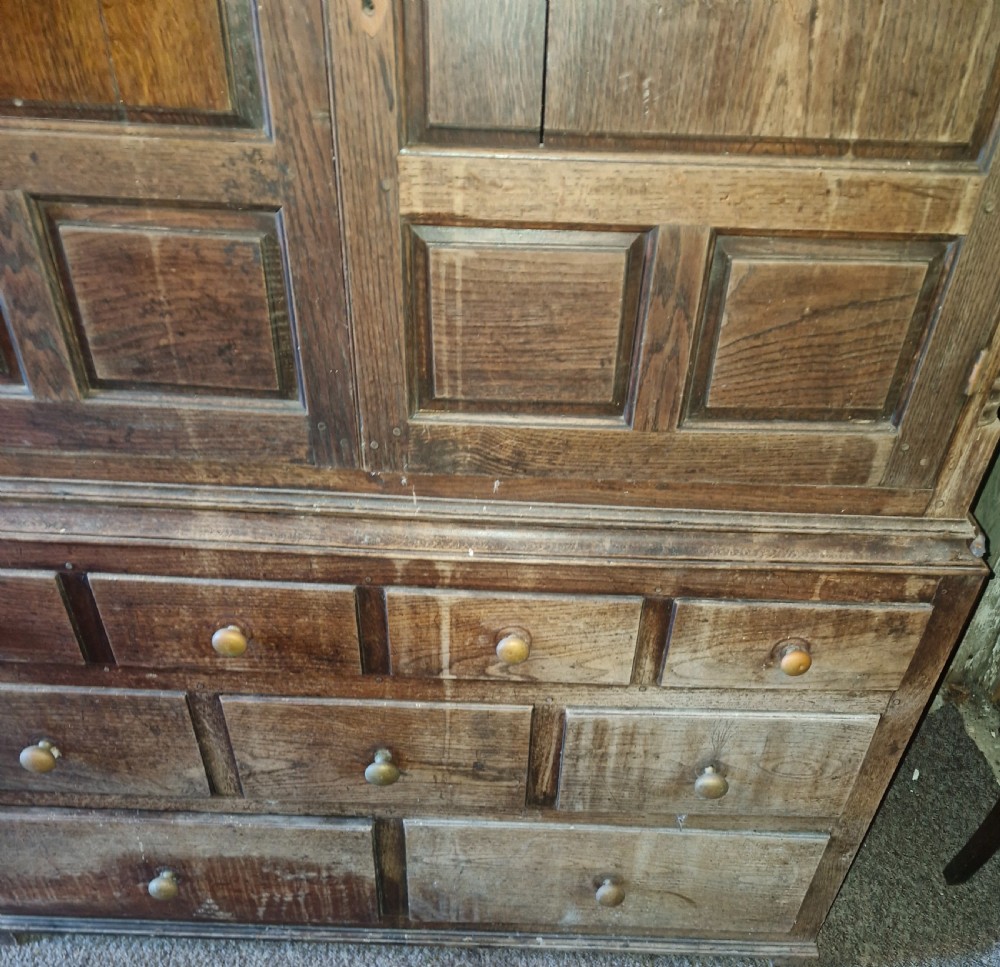Regency oak Welsh press hall cupboard with original hooks.  View X