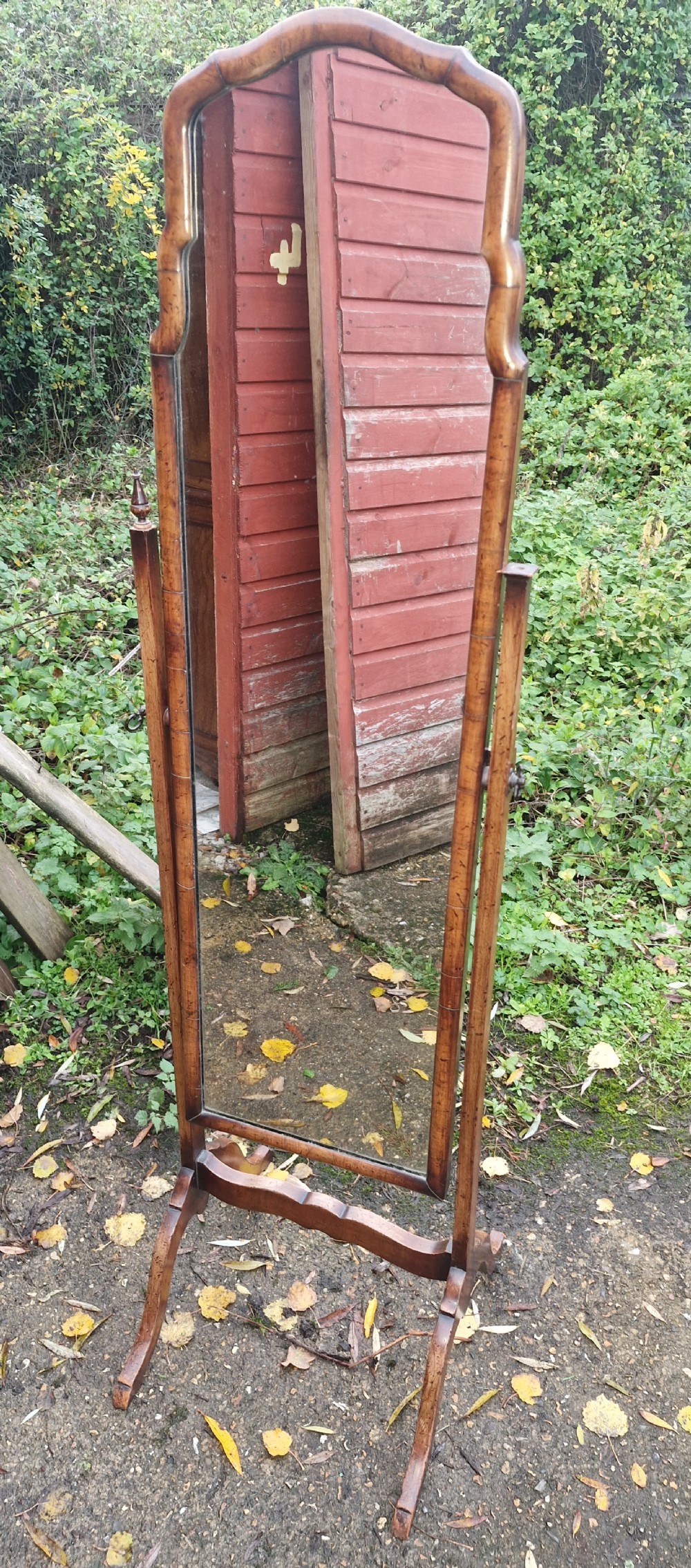 Early 20th century walnut cheval dressing mirror  .