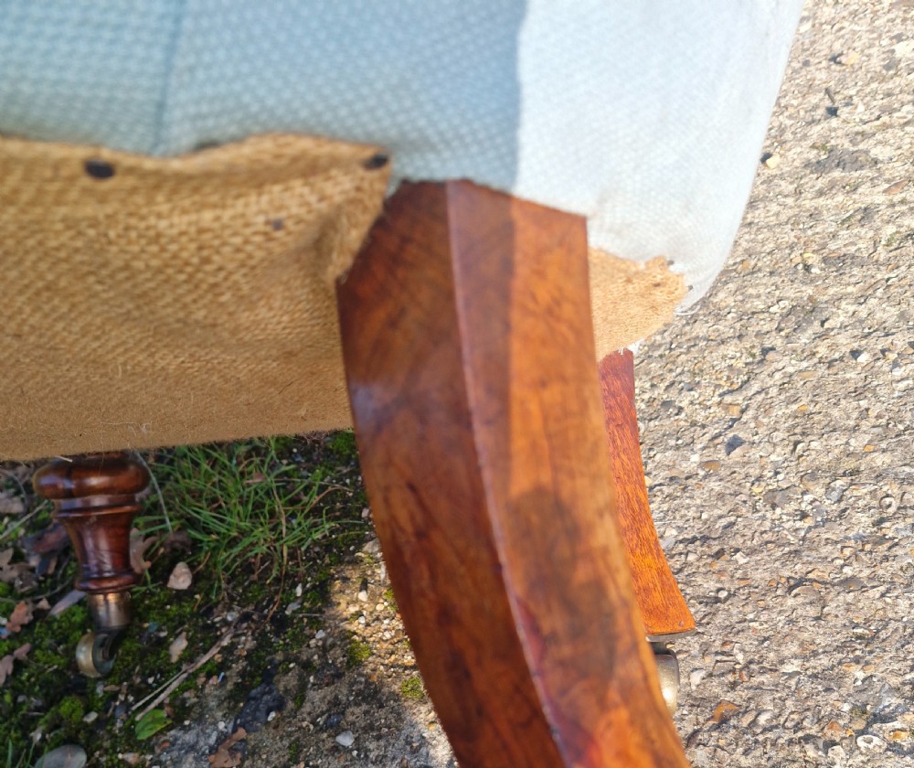 Victorian upholstered bedroom chair on walnut legs and castors.  View III