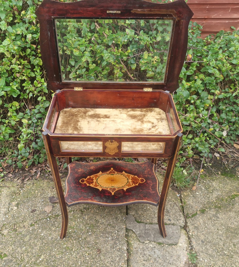 Unusual decorated bijouterie display table.  View II