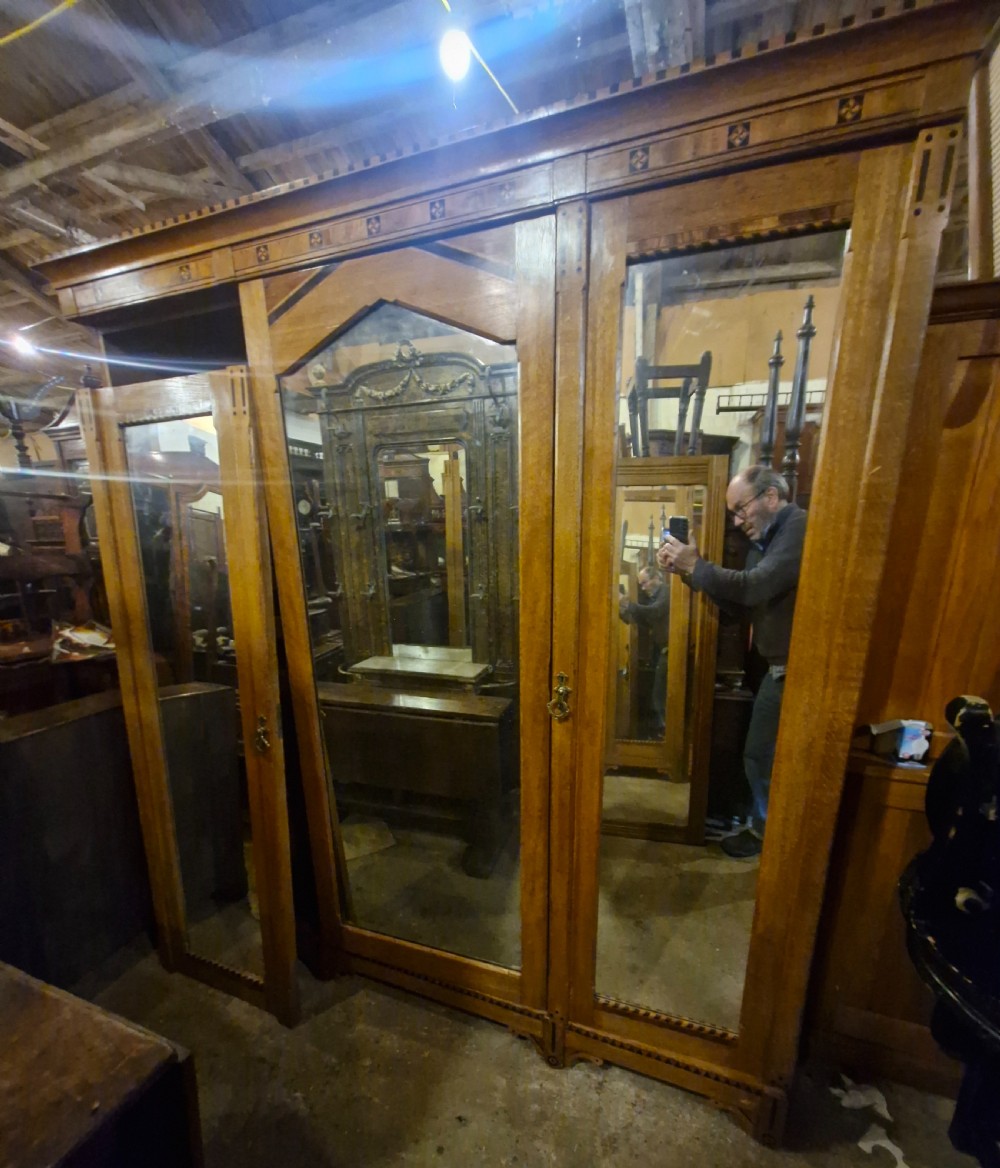 Victorian inlaid oak triple mirror door wardrobe in the manner of Charles Bevan. View III