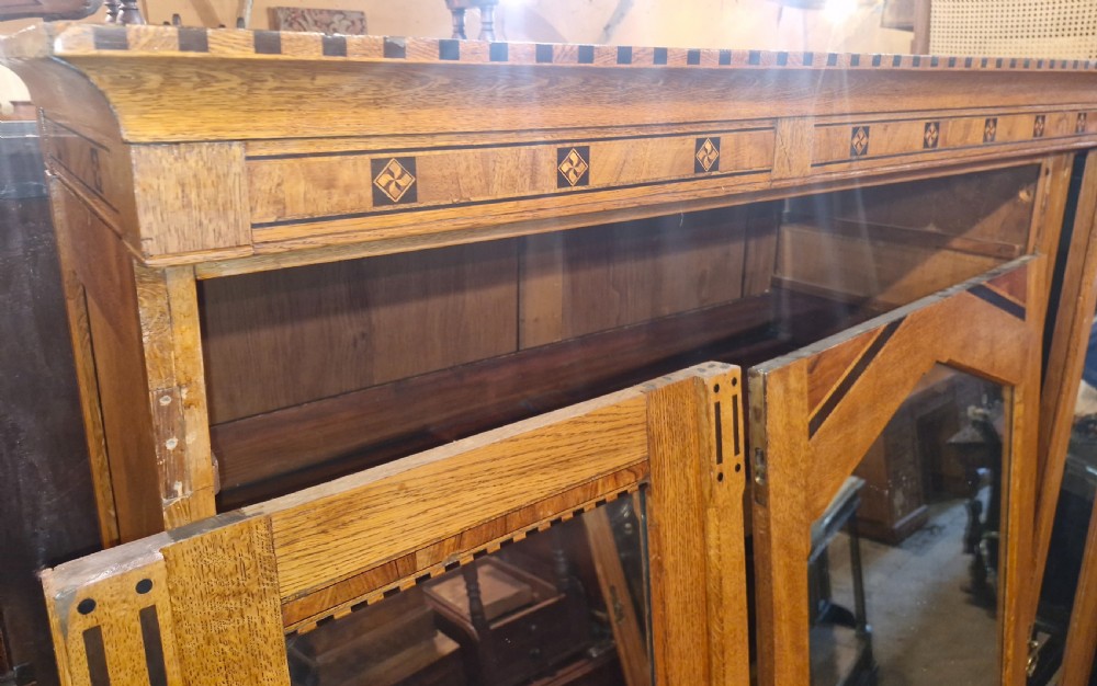 Victorian inlaid oak triple mirror door wardrobe in the manner of Charles Bevan. View XIII