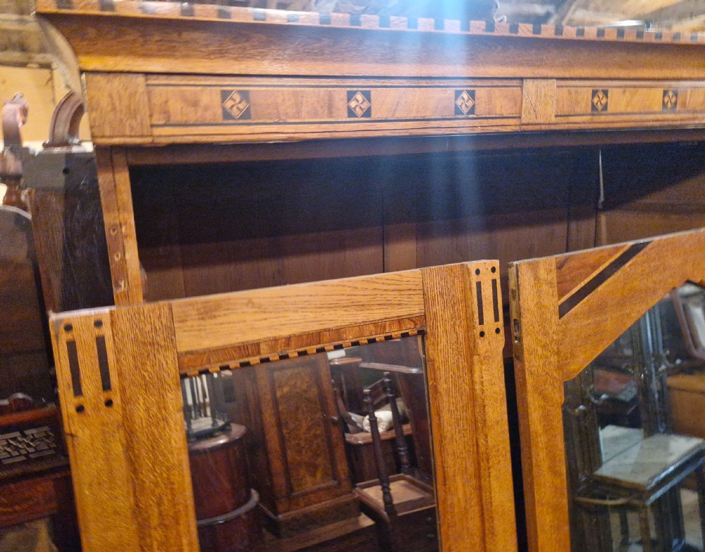 Victorian inlaid oak triple mirror door wardrobe in the manner of Charles Bevan. View XVII