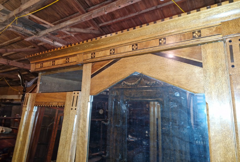 Victorian inlaid oak triple mirror door wardrobe in the manner of Charles Bevan. View XXII