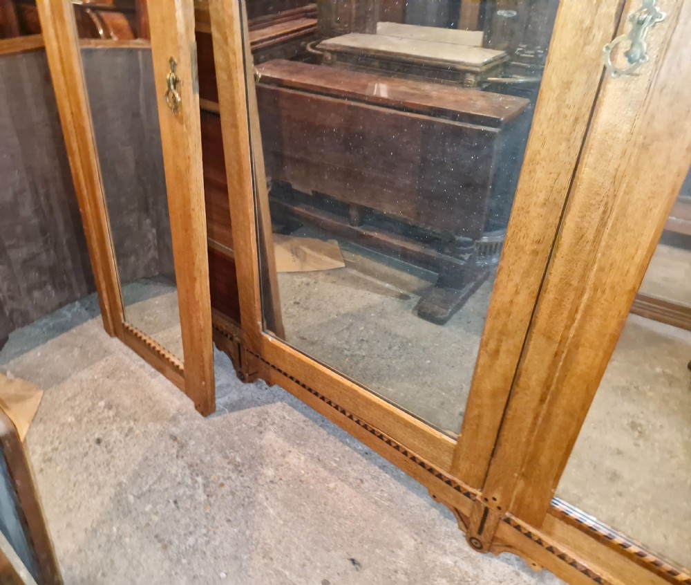 Victorian inlaid oak triple mirror door wardrobe in the manner of Charles Bevan. View XXIV