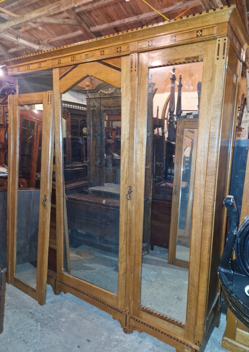 Victorian inlaid oak triple mirror door wardrobe in the manner of Charles Bevan. View XXVI