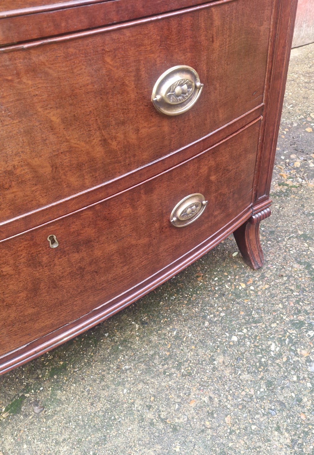 Regency mahogany bow front chest of drawers. With sabre front legs. View IV