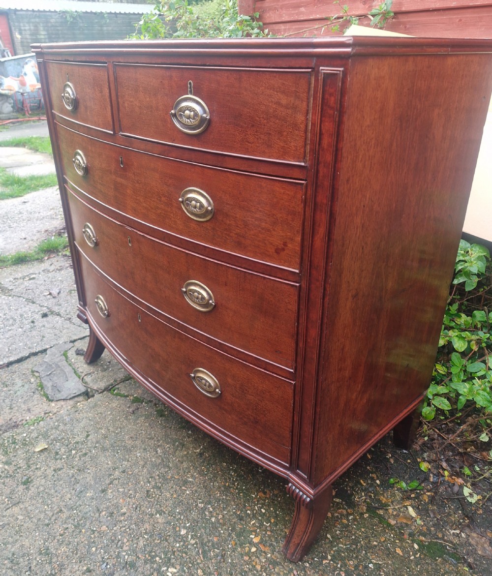 Regency mahogany bow front chest of drawers. With sabre front legs. View VI