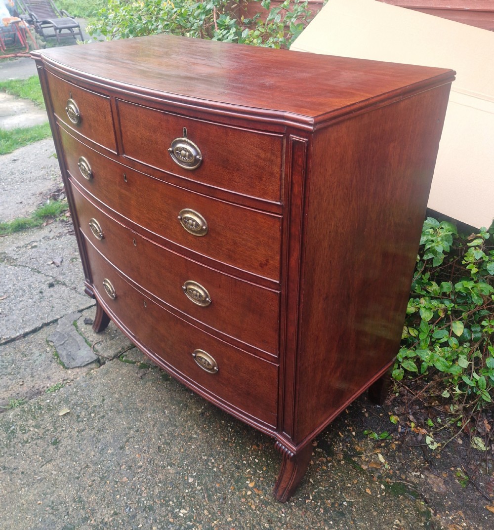 Regency mahogany bow front chest of drawers. With sabre front legs. View VIII