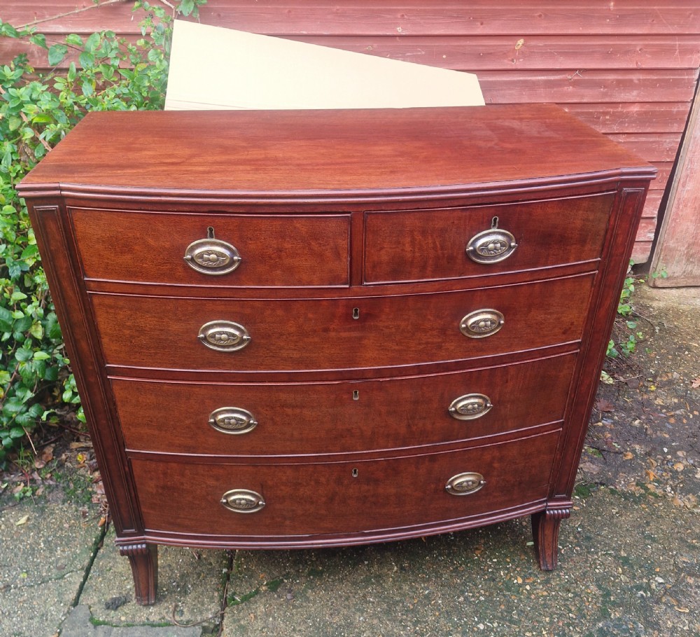 Regency mahogany bow front chest of drawers. With sabre front legs. View IX