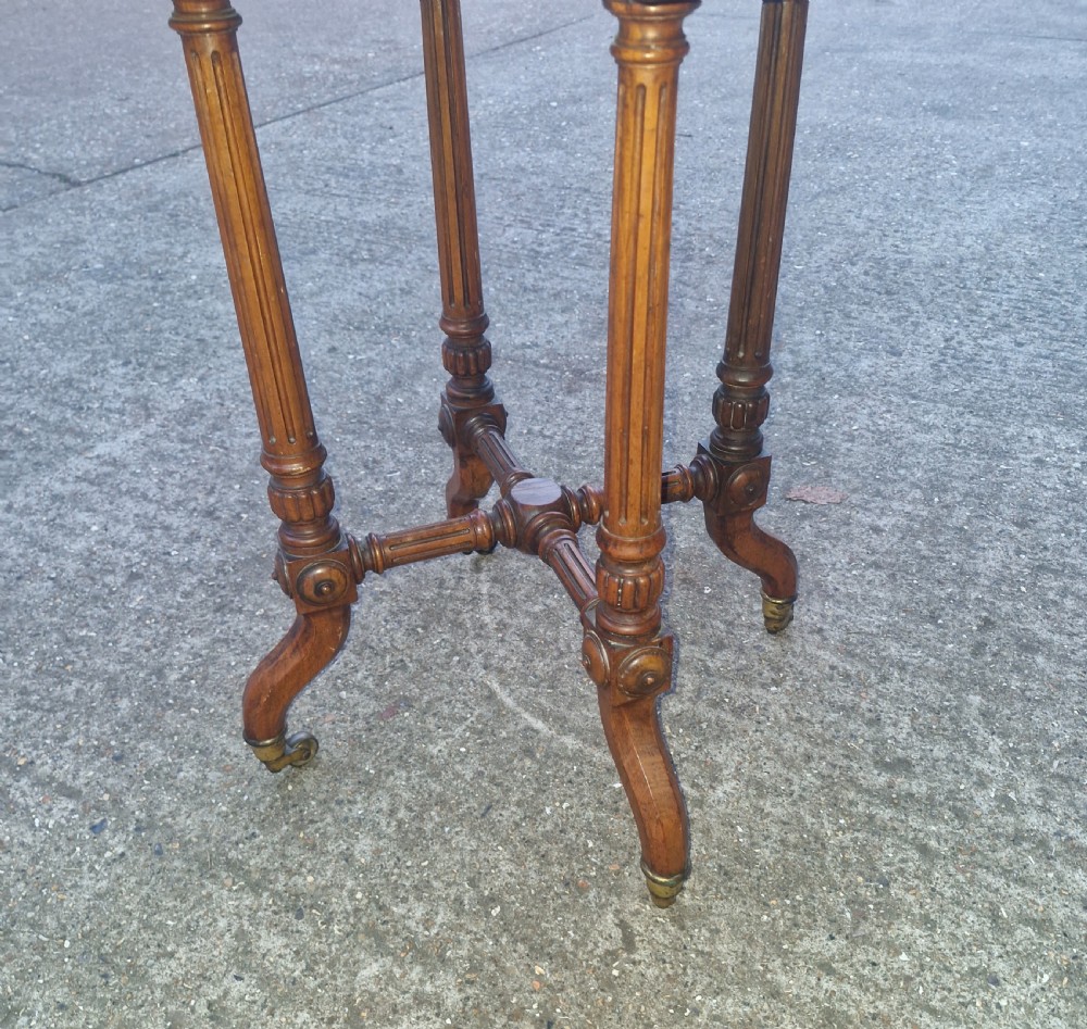 Late Victorian occasional table following a Gillows design . View II