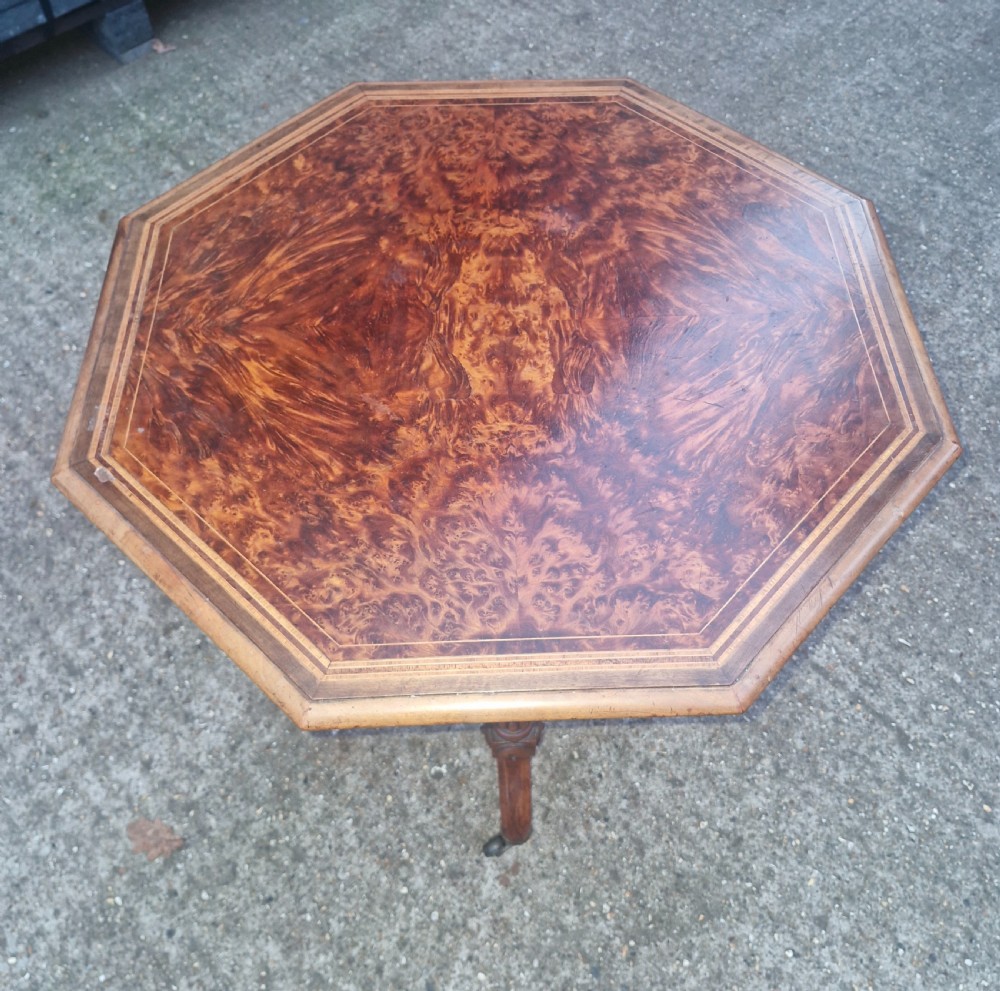 Late Victorian occasional table following a Gillows design . View V